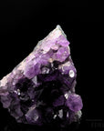 Natürlicher Amethyst Kristall, fördert intuitive Energie, ungeschliffene violette Struktur.