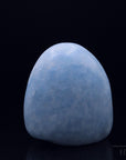Blauer Calcit Heilstein, fördert klare Meditation, blaue Kristalloberfläche.