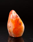 Carneol Heilstein, Heilstein für klare Motivation, orange Kristalloberfläche.