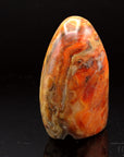Strahlender Carneol, Heilstein für spirituelle Klarheit, orange glänzende Form.