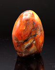 Strahlender Carneol, Heilstein für meditative Praxis, orange glänzende Form.