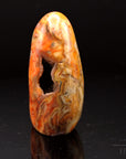 Strahlender Carneol, Heilstein für spirituelle Balance, orange natürliche Form.