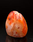 Carneol Heilstein, Heilstein für spirituellen Mut, orange glatte Form.