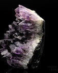 Natürlicher Amethyst Kristall, fördert meditative Balance, ungeschliffene violette Struktur.
