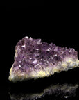 Natürlicher Amethyst Kristall, fördert meditative Balance, ungeschliffene violette Struktur.