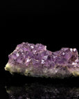Natürlicher Amethyst Kristall, Heilstein für klare Meditation, ungeschliffene violette Form.