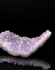 Natürlicher Amethyst Kristall, fördert energetische Harmonie, violette glänzende Struktur.