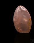 Strahlender Rosenquarz, Heilstein für innere Liebe, rosa Oberfläche.
