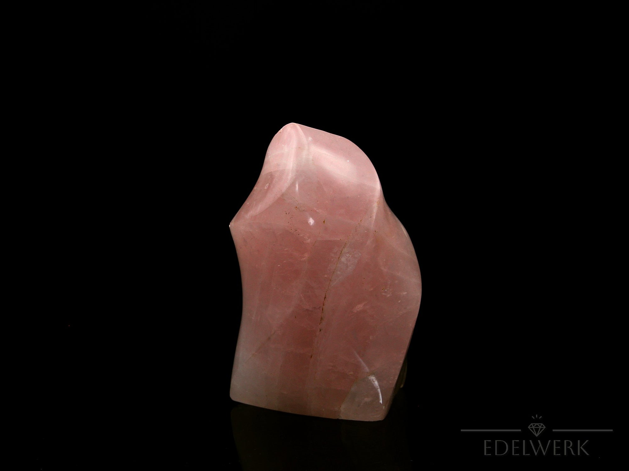 Klarer Rosenquarz, fördert intuitive Ruhe, rosa natürliche Form.