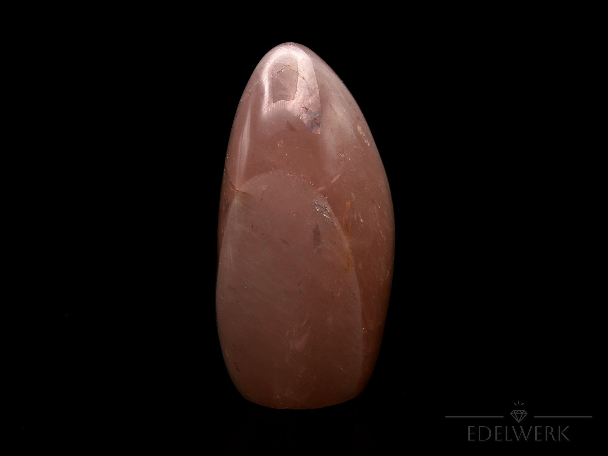 Natürlicher Rosenquarz, Heilstein für energetische Schutz, rosa Kristallform.