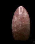 Natürlicher Rosenquarz, fördert meditative Ruhe, ungeschliffene rosa Struktur.