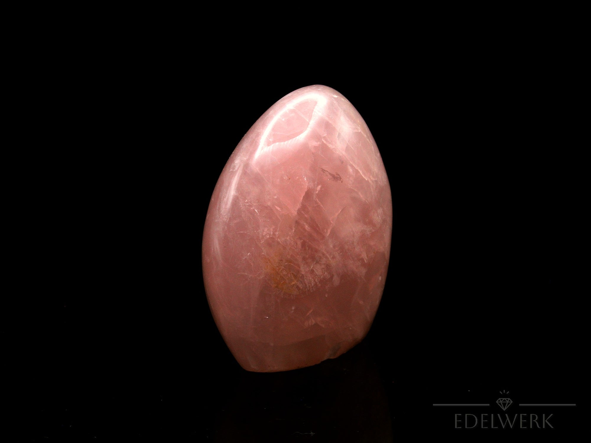 Natürlicher Rosenquarz, Heilstein für spirituellen Schutz, rosa Form.