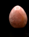 Strahlender Rosenquarz, Heilstein für meditative Praxis, rosa glänzende Form.