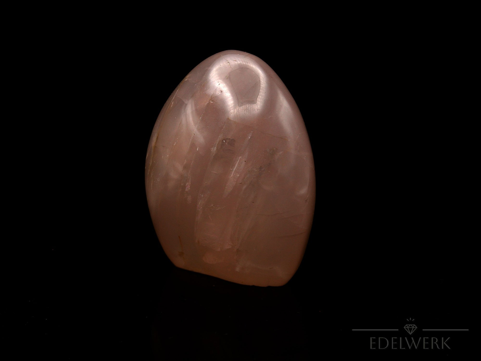 Rosenquarz Heilstein, Heilstein für innere Balance, rosa Oberfläche.