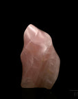 Klarer Rosenquarz, fördert spirituelle Ruhe, durchsichtige rosa Oberfläche.