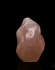 Rosenquarz Heilstein, Heilstein für meditative Ruhe, rosa glänzende Form.