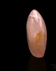 Klarer Rosenquarz, fördert meditative Harmonie, durchsichtige rosa Oberfläche.