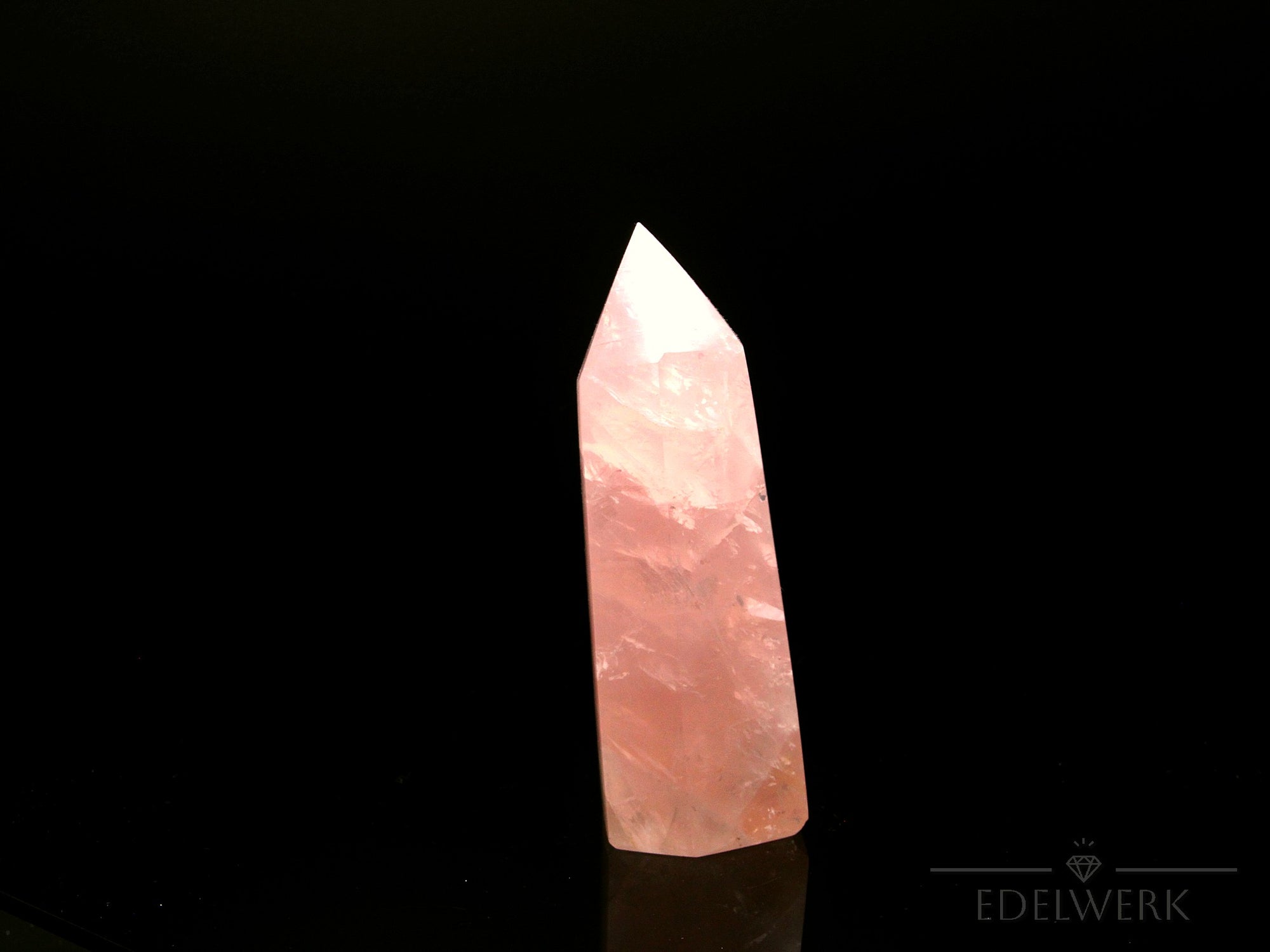 Rosenquarz Heilstein, Heilstein für meditative Klarheit, rosa Struktur.
