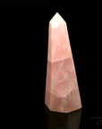 Klarer Rosenquarz, Heilstein für spirituelle Kraft, rosa glänzende Struktur.