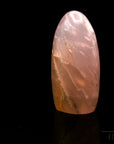 Klarer Rosenquarz, fördert spirituelle Balance, rosa glänzende Kristalle.