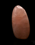 Natürlicher Rosenquarz, fördert meditative Ruhe, ungeschliffene rosa Struktur.