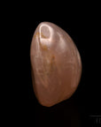 Strahlender Rosenquarz, Heilstein für spirituelle Klarheit, rosa glänzende Form.