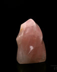 Klarer Rosenquarz, fördert spirituelle Balance, rosa glänzende Kristalle.