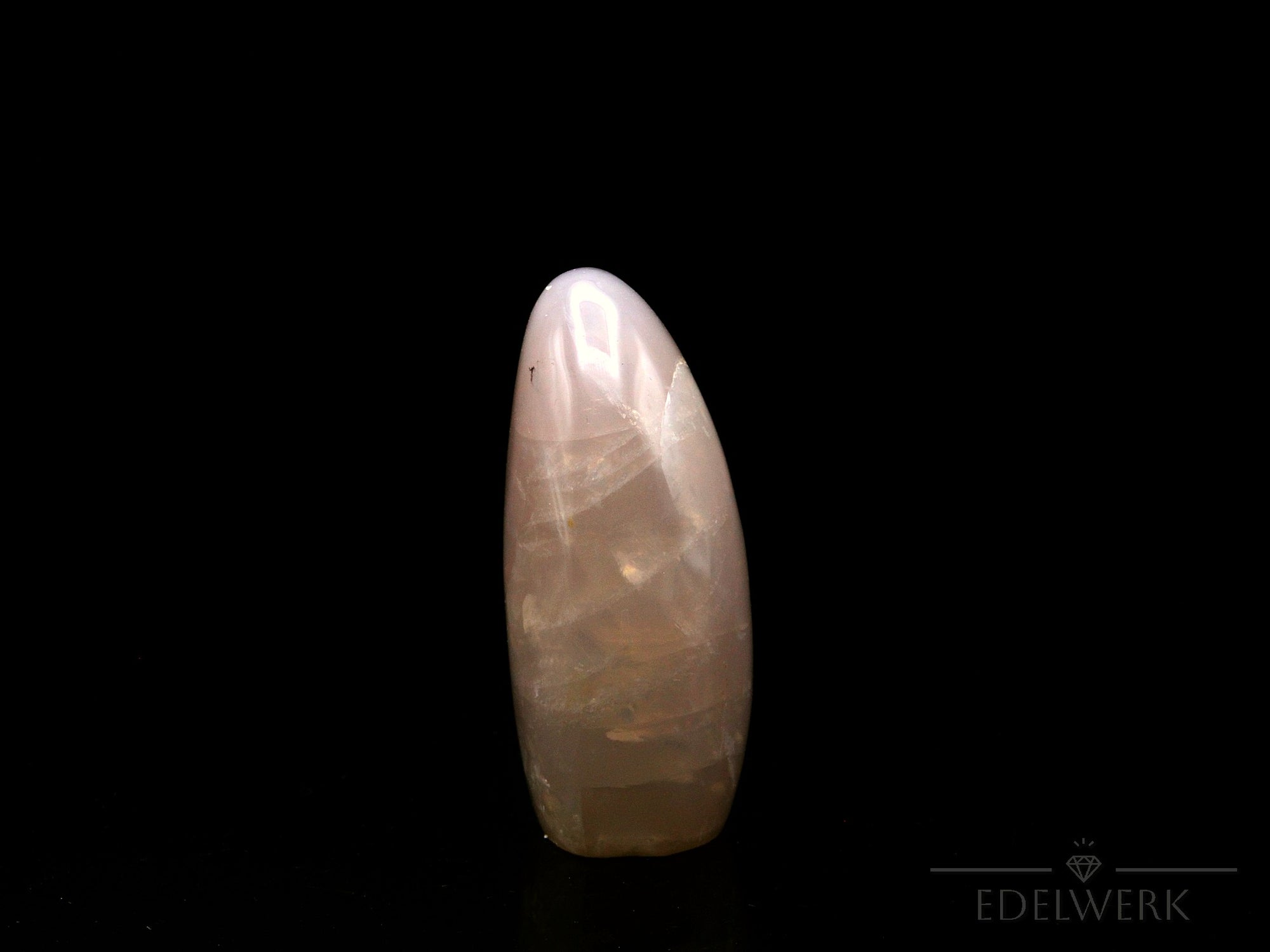 Natürlicher Rosenquarz, Heilstein für spirituellen Schutz, rosa Form.