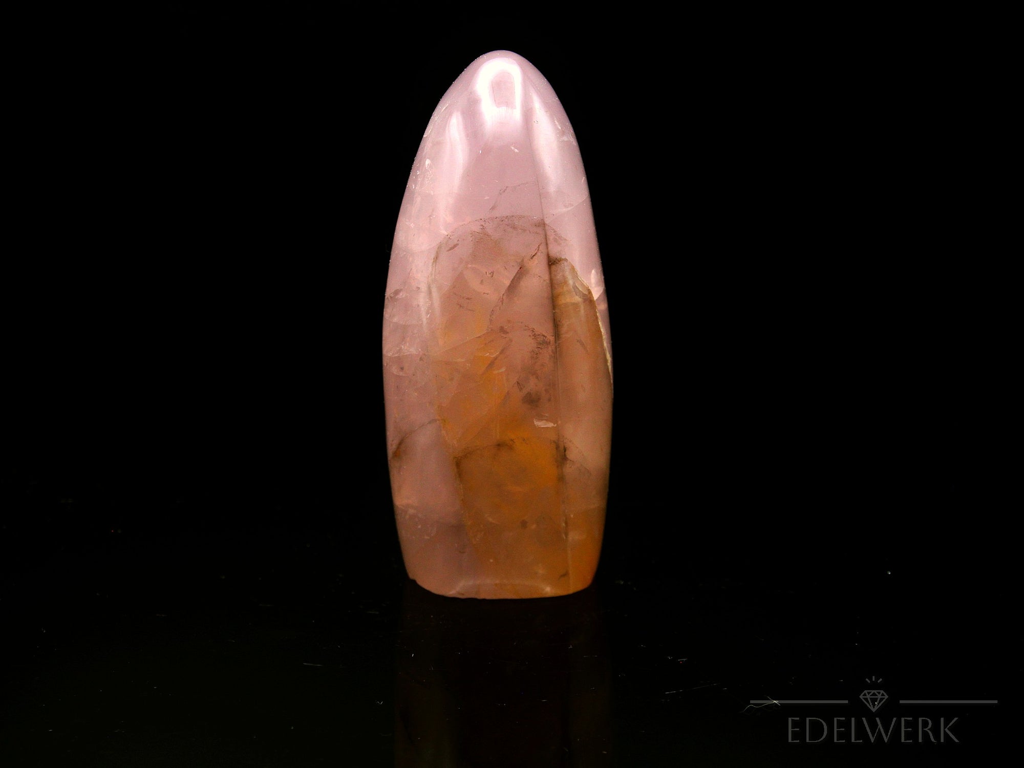 Klarer Rosenquarz, fördert energetische Klarheit, rosa natürliche Form.