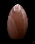 Natürlicher Rosenquarz, fördert klare Intuition, rosa glänzende Struktur.