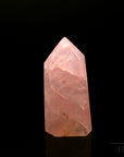 Rosenquarz Heilstein, fördert meditative Balance, rosa Kristallstruktur.