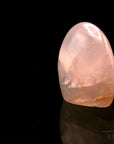 Strahlender Rosenquarz, Heilstein für klare Praxis, rosa glänzende Form.