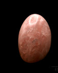 Rosenquarz Heilstein, fördert meditative Energie, rosa natürliche Struktur.
