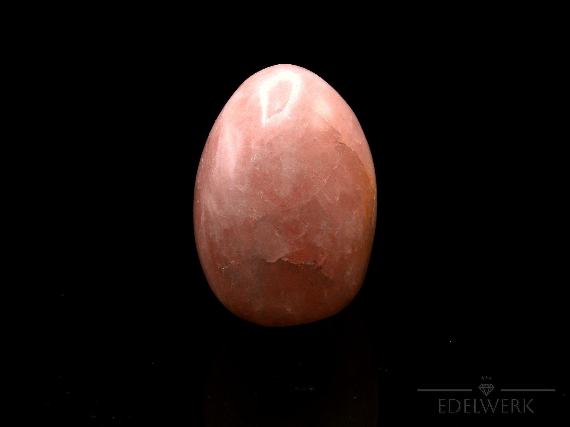 Rosenquarz Heilstein, Heilstein für klare Liebe, rosa glänzende Form.
