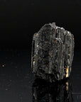 Klarer Schwarzer Turmalin, fördert schützende Kraft, glänzende schwarze Form.