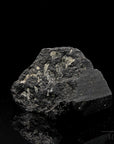 Klarer Schwarzer Turmalin, fördert energetische Balance, durchsichtige schwarze Oberfläche.