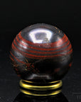 Tigeraugen Kugel Planet, Heilstein für meditative Ruhe, gold-braune Kugelstruktur.