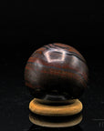 Tigeraugen Kugel Planet, fördert spirituelle Energie, gold-braune Kugelstruktur.
