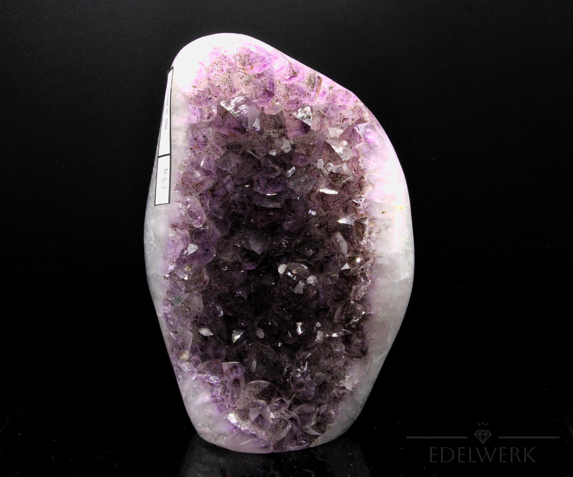 Natürliche Amethyst Druse, fördert spirituelle Harmonie, violette glänzende Form.