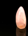 Klarer Rosenquarz, Heilstein für spirituelle Ausgeglichenheit, rosa glänzende Struktur.