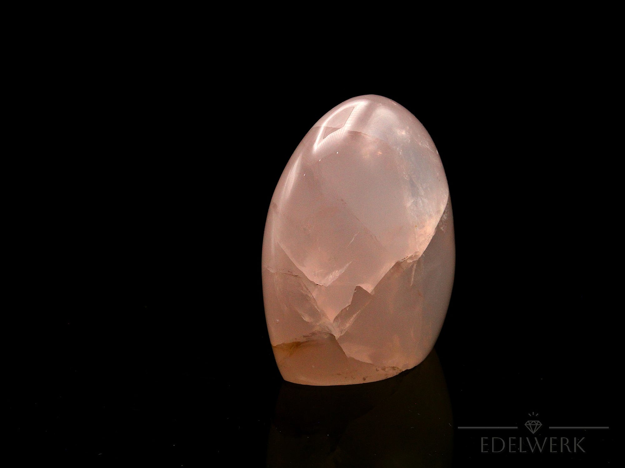 Strahlender Rosenquarz, Heilstein für innere Balance, rosa Oberfläche.
