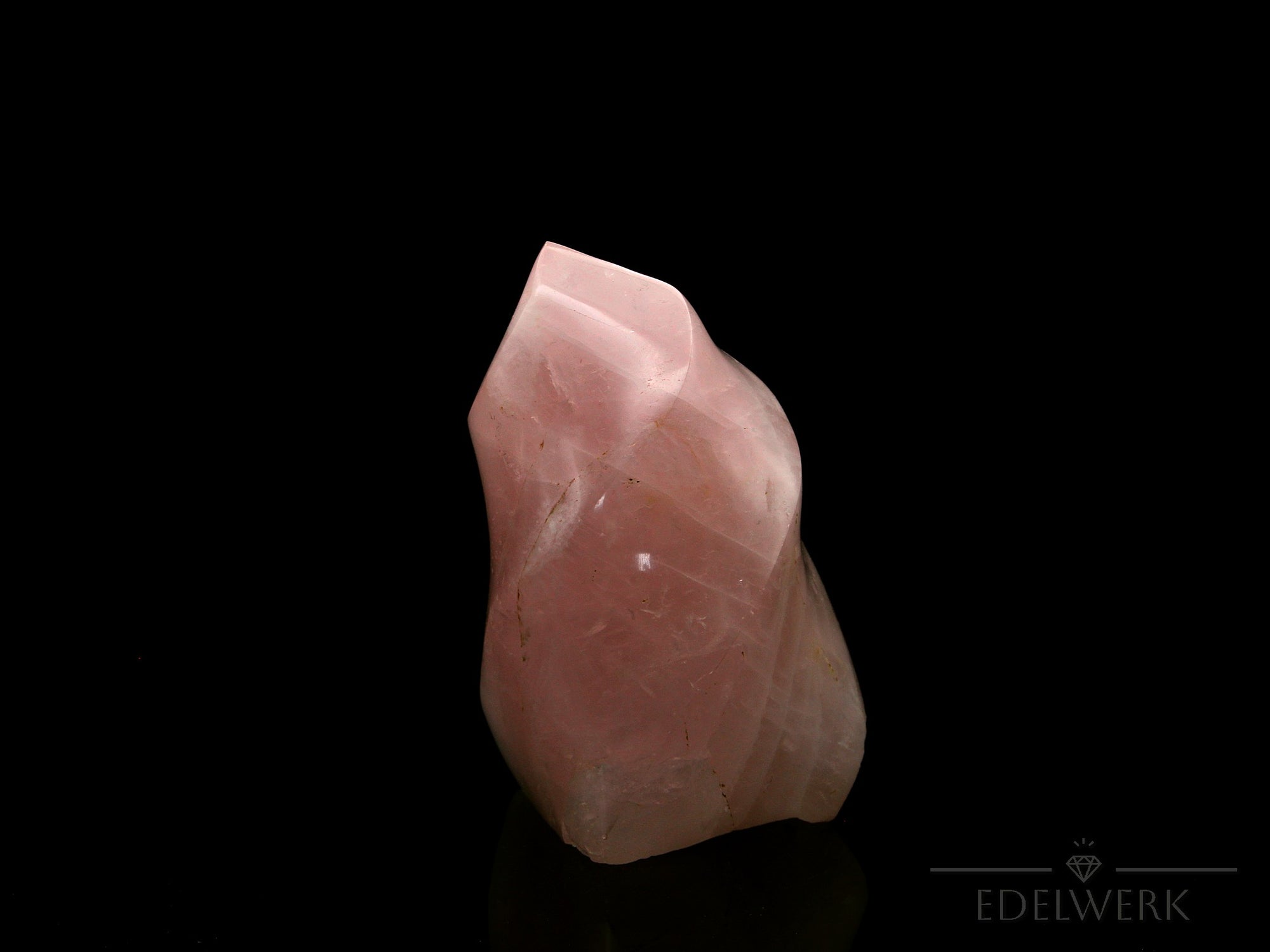 Klarer Rosenquarz, Heilstein für klare Energie, rosa Kristallform.