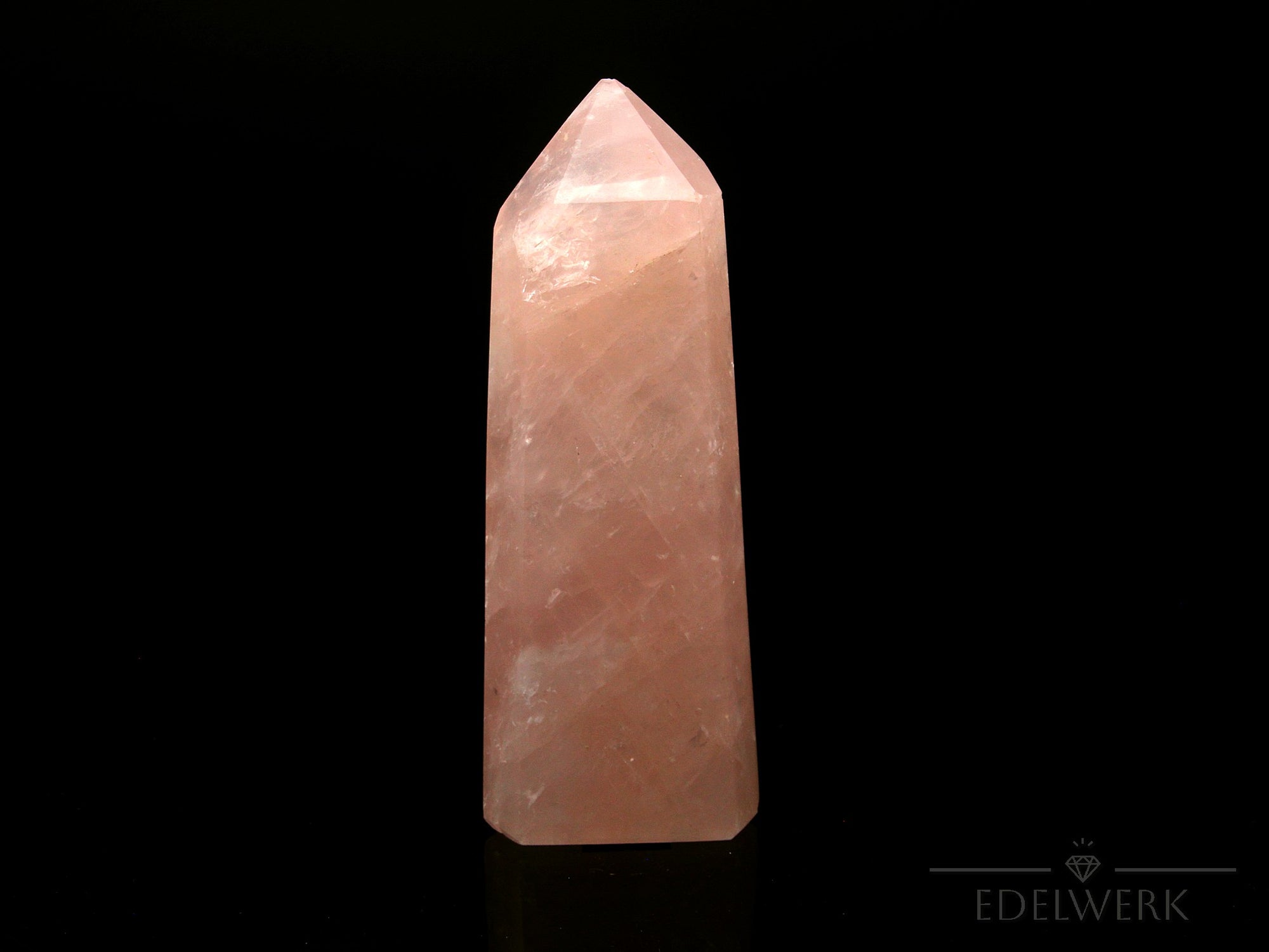 Strahlender Rosenquarz, Heilstein für innere Balance, rosa Oberfläche.