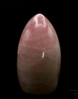 Natürlicher Rosenquarz, fördert spirituelle Balance, rosa Oberfläche.