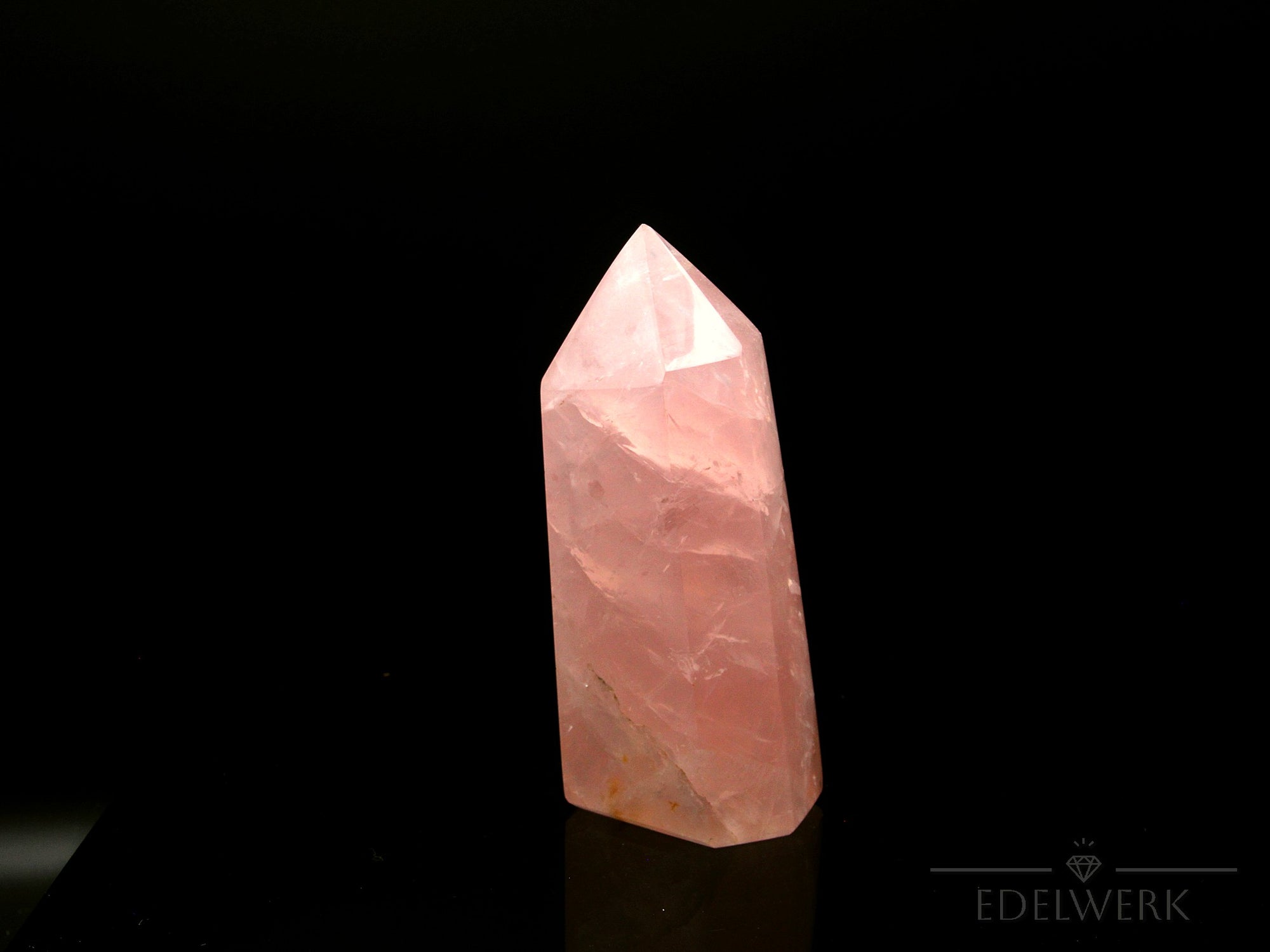 Rosenquarz Heilstein, Heilstein für innere Harmonie, rosa Oberfläche.