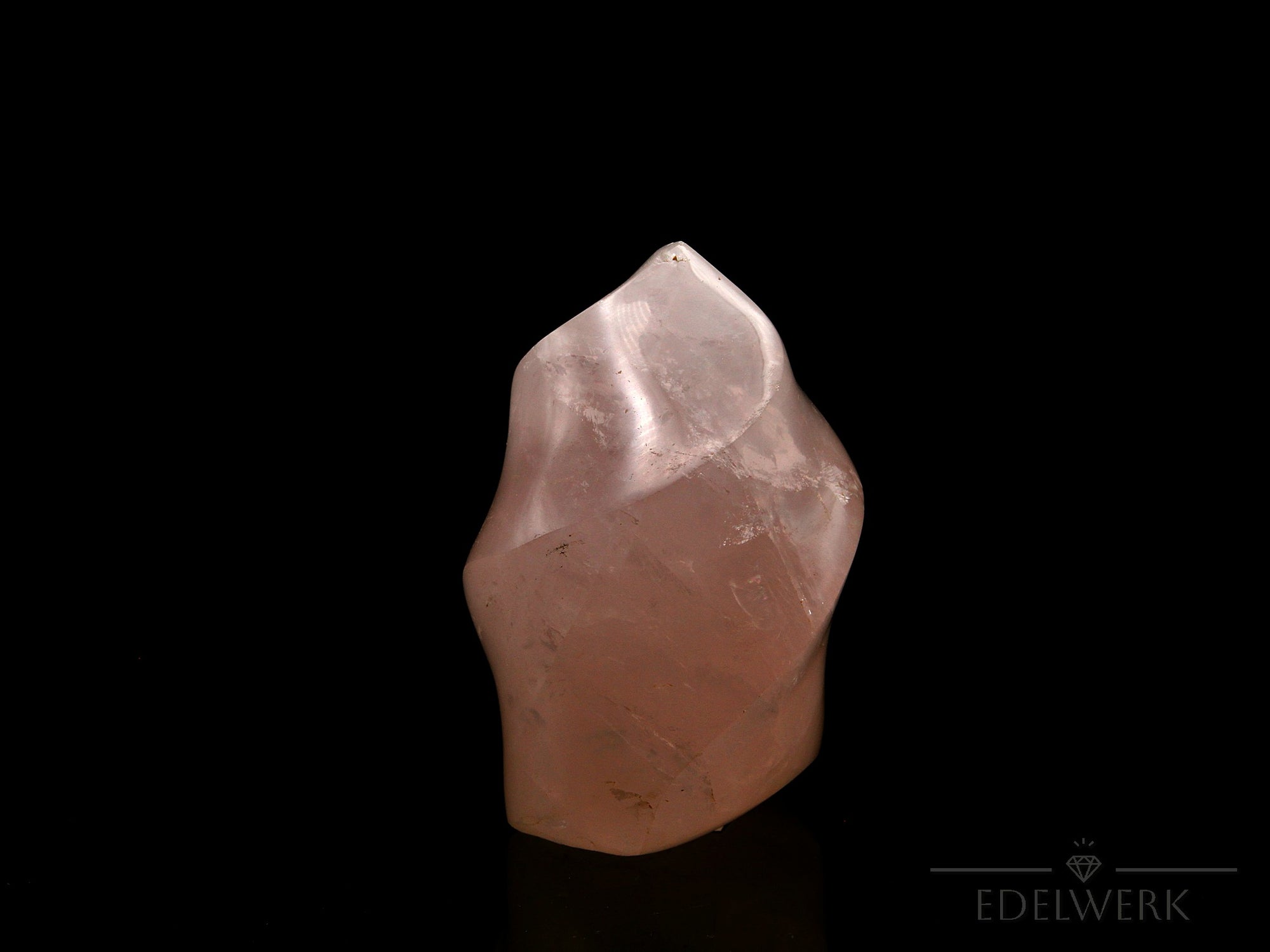 Rosenquarz Heilstein, Heilstein für innere Balance, rosa Oberfläche.