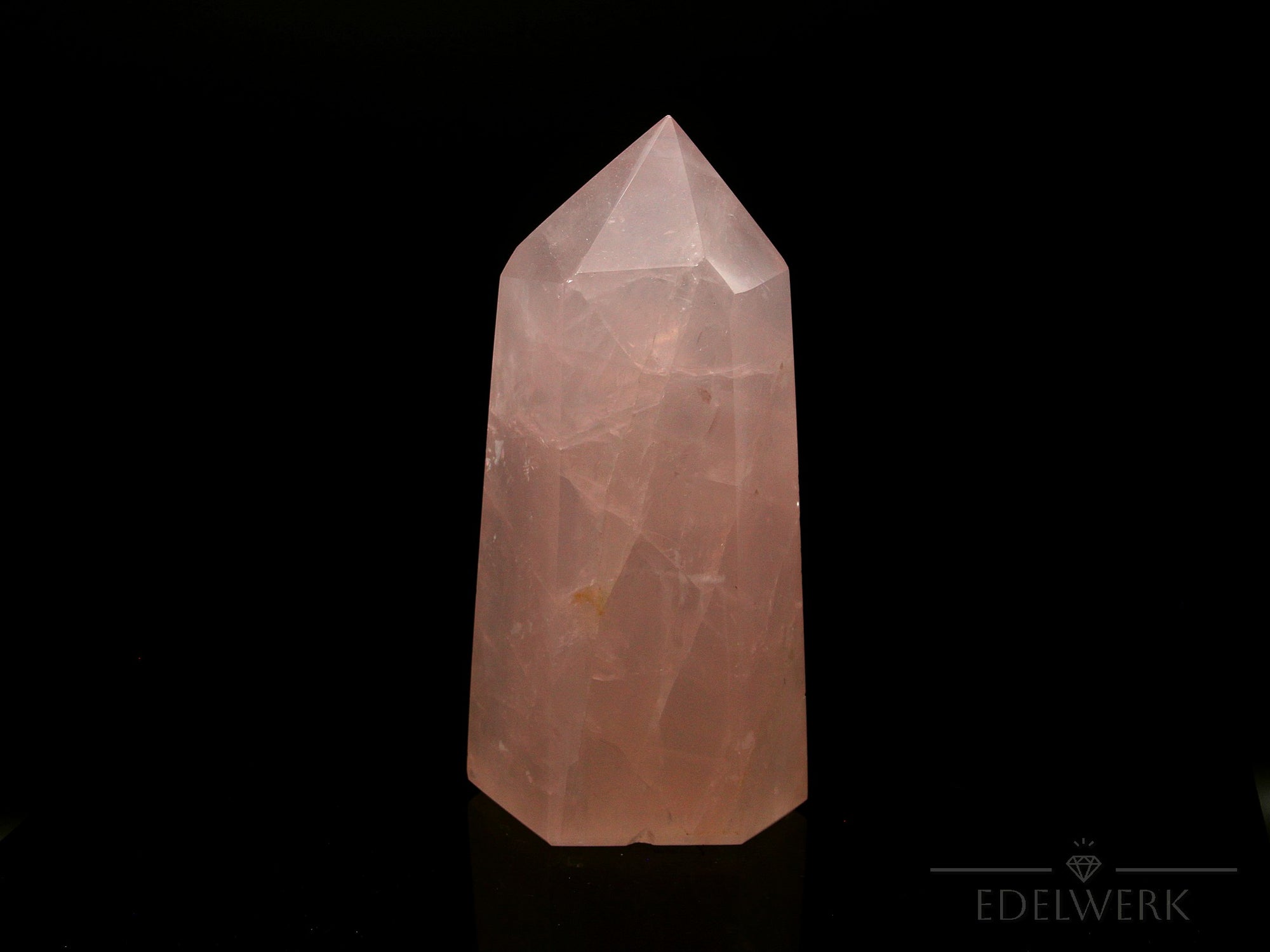 Klarer Rosenquarz, Heilstein für klare Energie, rosa Kristallform.