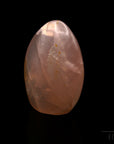 Strahlender Rosenquarz, fördert spirituelle Liebe, rosa Kristalloberfläche.
