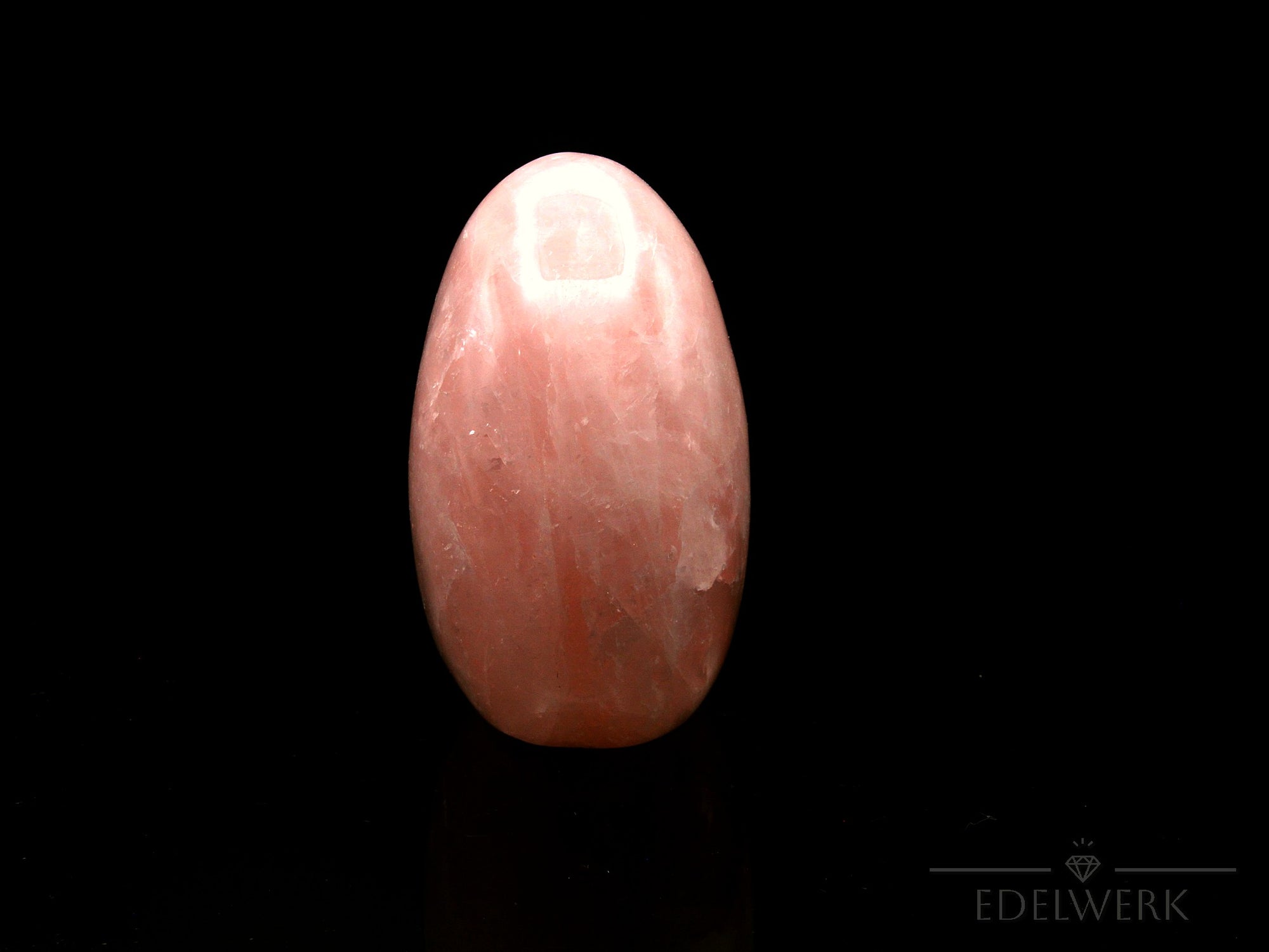 Rosenquarz Heilstein, Heilstein für innere Harmonie, rosa Oberfläche.