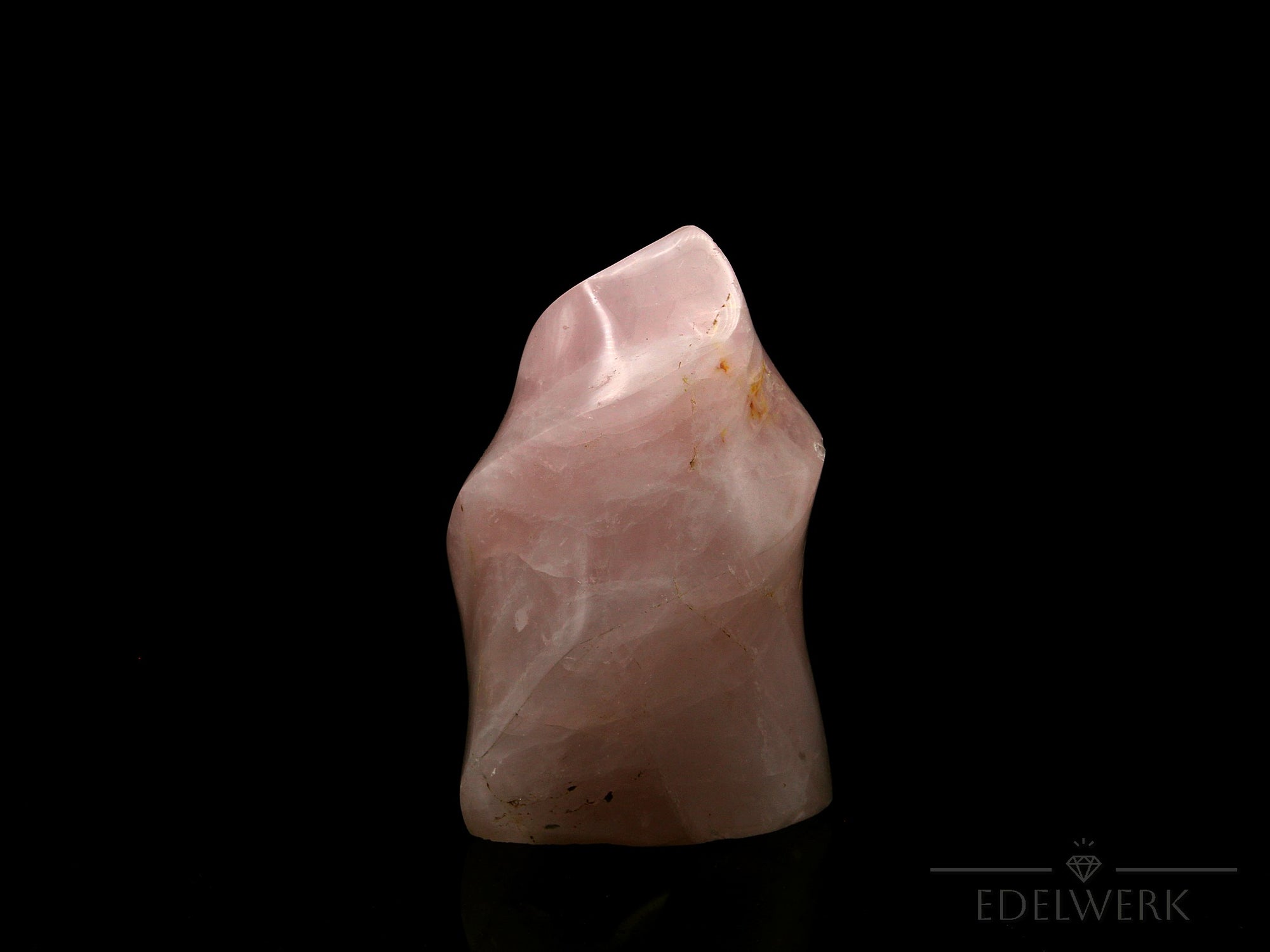 Klarer Rosenquarz, Heilstein für meditative Harmonie, durchsichtige rosa Struktur.
